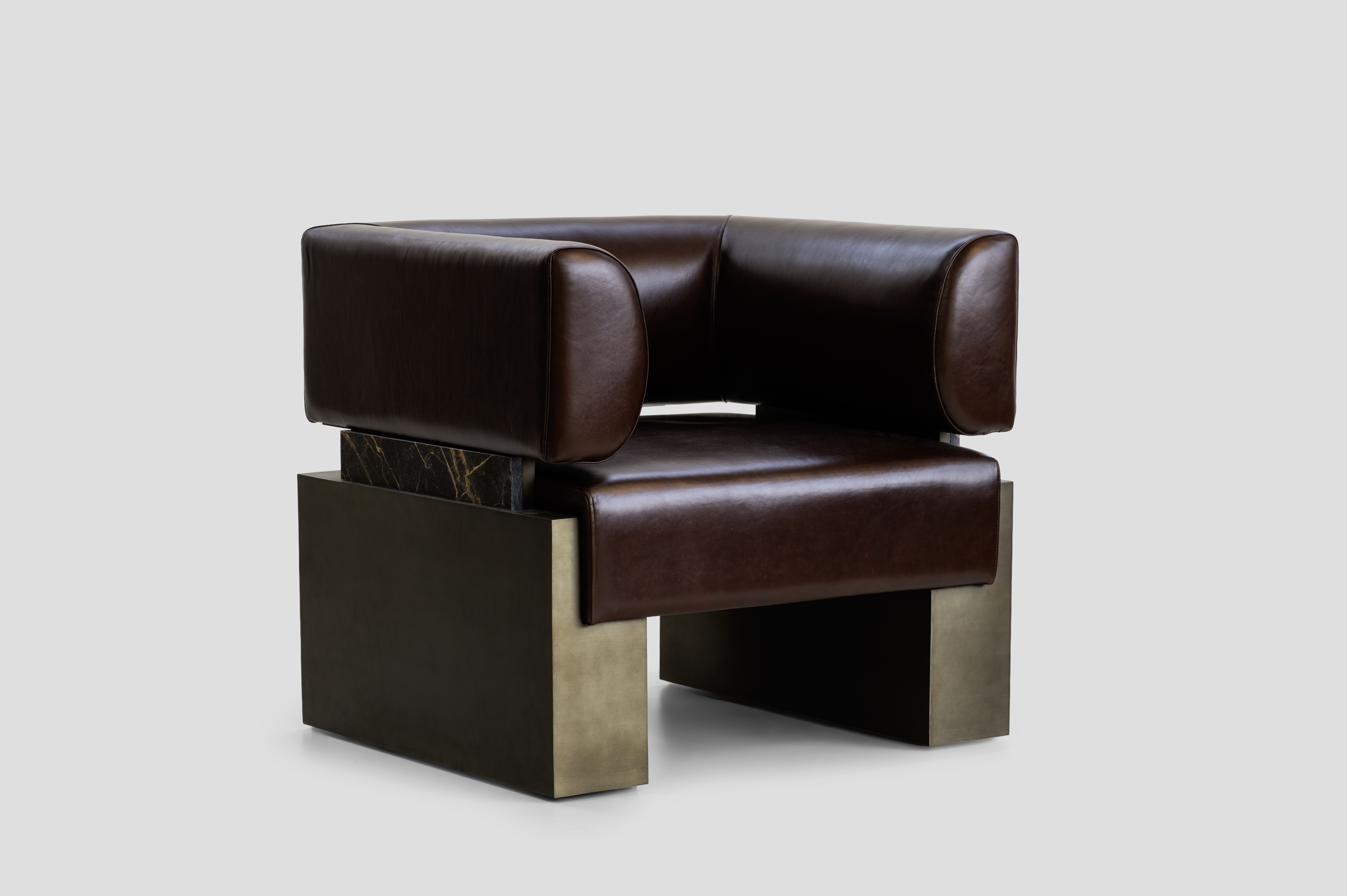 Armchair — leather, marble base, stainless steel frame