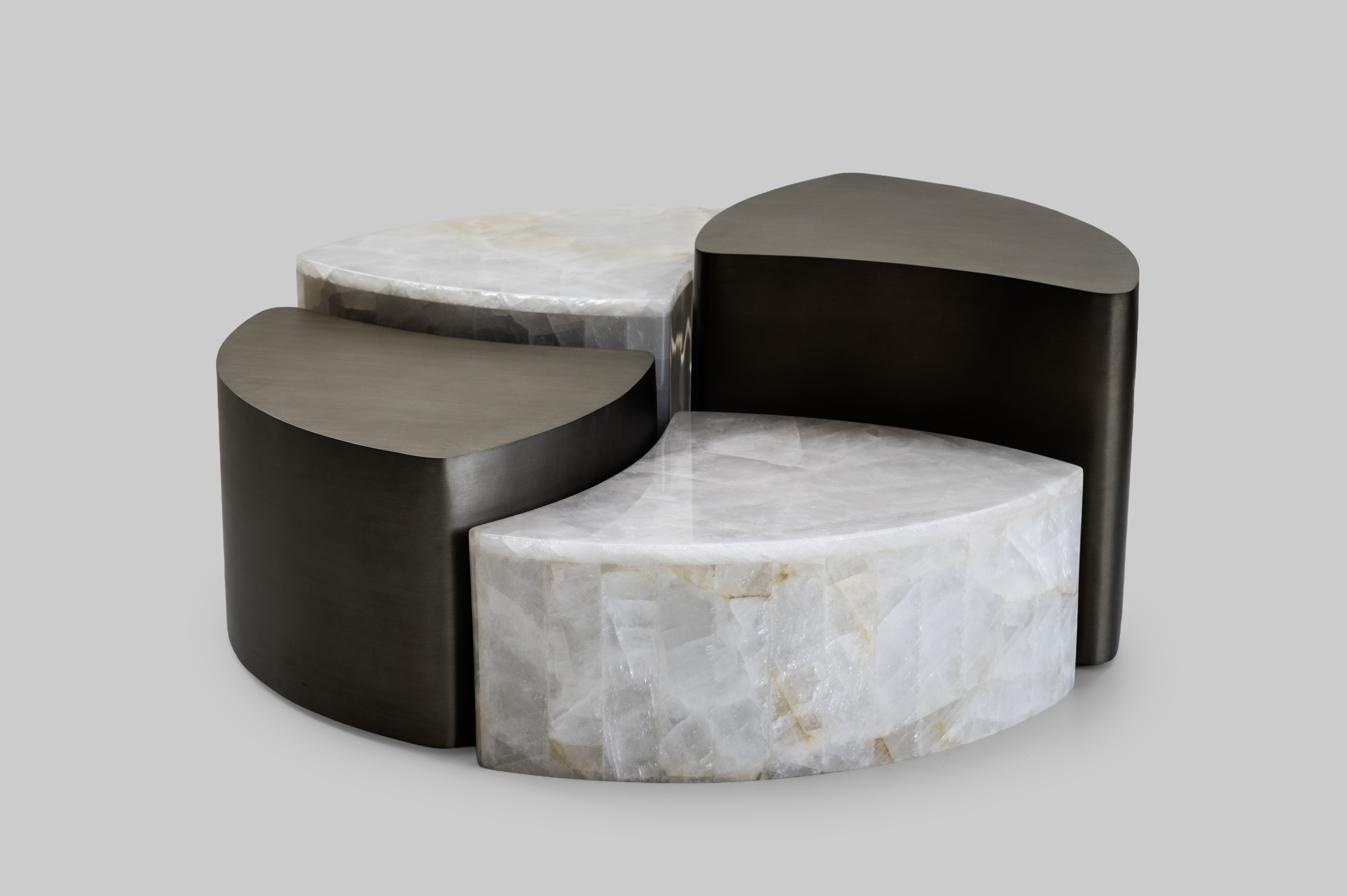 Pebble Table — white quartz form on stainless steel structure