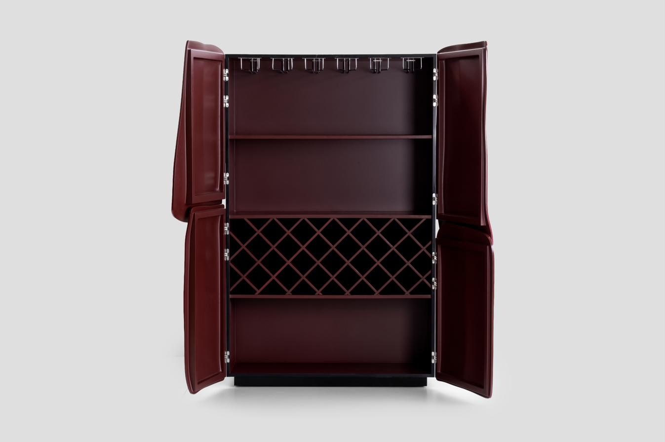 Silver Leaf Cabinet — interior in oxblood lacquer, bar configuration with stemware and bottle storage